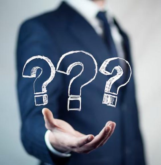 businessman-hand-question-mark